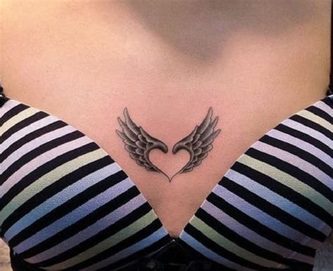 tatuaje corazon con flores|tatuajes de corazones y alas.